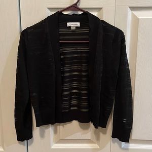 Cropped black cardigan.